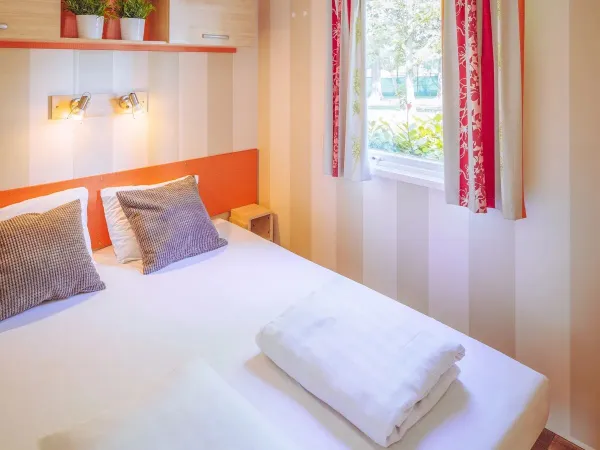 Roan Comfort Plus Lounge bedroom with a double bed.