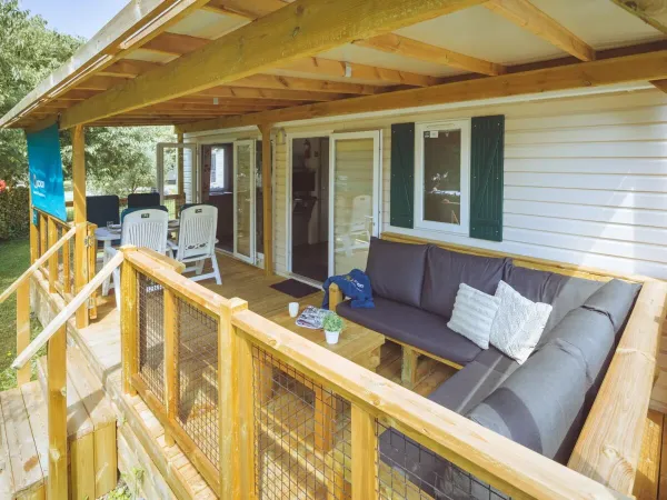 The spaciously covered veranda of the Roan Comfort Plus Lounge.