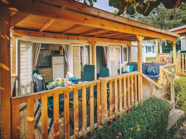 Covered decking with beautiful Roan Comfort Plus Relax lounge sofa.