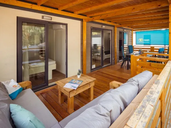 The Roan Comfort Plus Lounge decking features a luxurious lounge sofa.