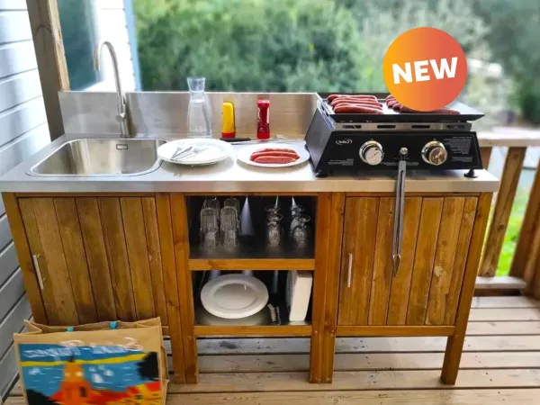 The Roan Premium Lounge features an outdoor kitchen.