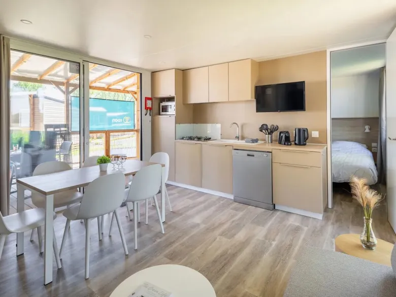 The Roan Supreme Plus Lounge living room with kitchen.