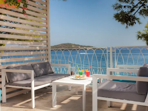 Cozy lounge seating overlooking the sea at Roan campsite Amadria Park Trogir.
