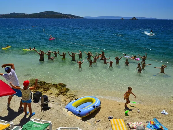 Aquagym in the clear sea with the animation team at Roan camping Amadria Park Trogir.