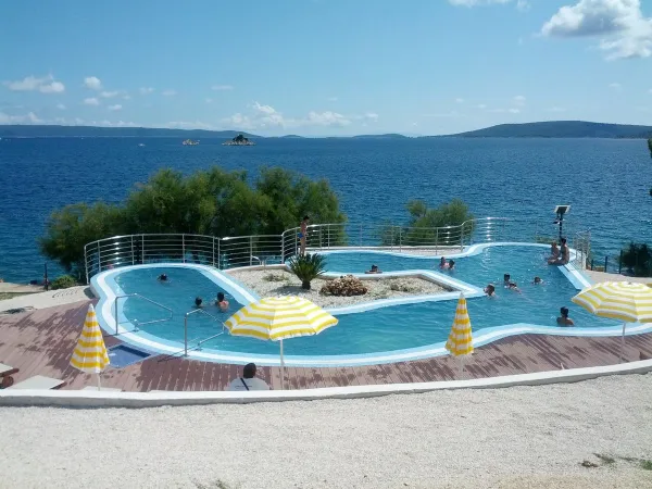 Swimming pool overlooking the sea at Roan campsite Amadria Park Trogir.