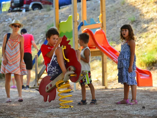 Children playing in the playground at Roan campsite Amadria Park Trogir.