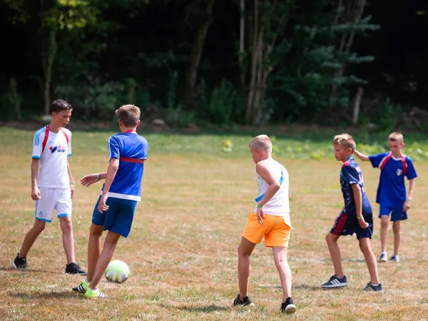 Playing soccer at Roan camping de Bonnal.