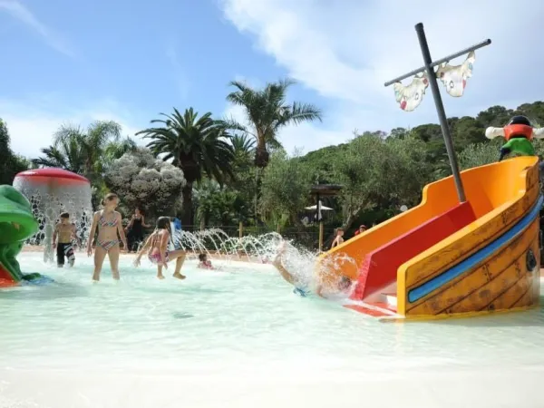 Water fun at children's pool at Roan camping Rosselba.