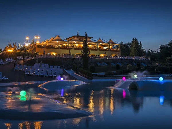 Lagoon pool overlooking restaurant at Roan camping hu Norcenni Girasole village.