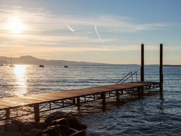 Pier during sunset at Roan camping Piantelle.