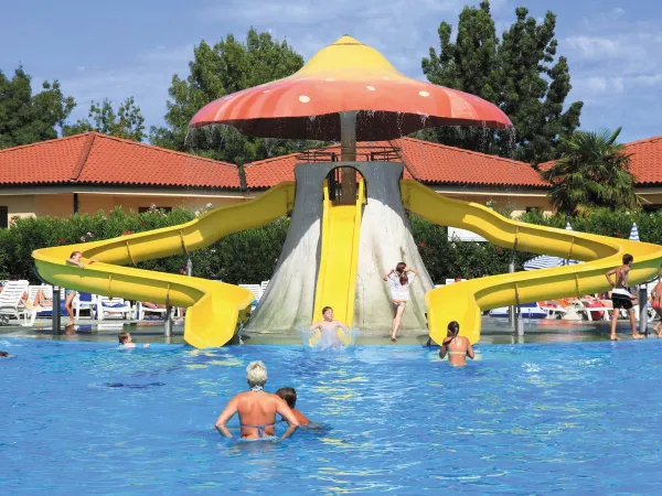 Water slide in pool at Roan camping Bella Italia.