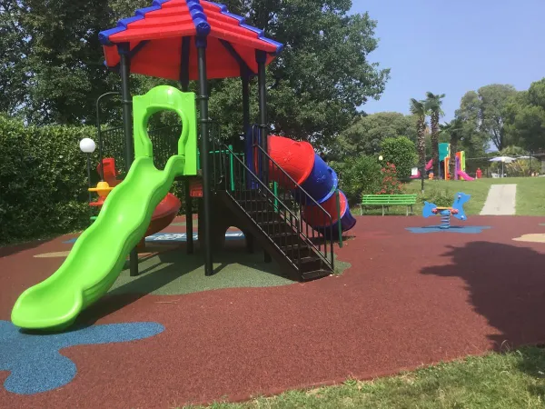 The playground at Roan camping La Rocca Manerba.