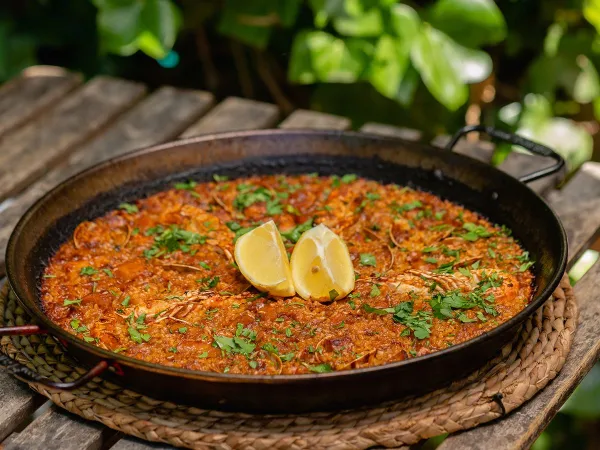 Paella dish available at Roan camping El Garrofer.