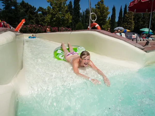 Slide in pool at Roan camping Norcenni Girasole.