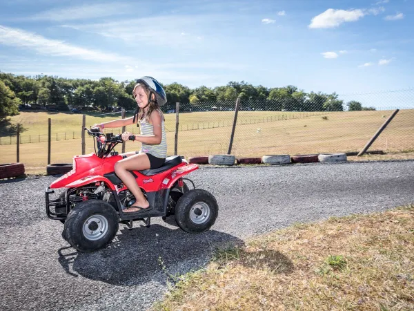 Miniquad riding at Roan camping Avit Loisirs.