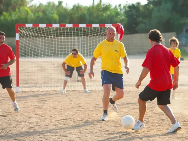 2 teams play soccer at Roan Camping El Pinar.