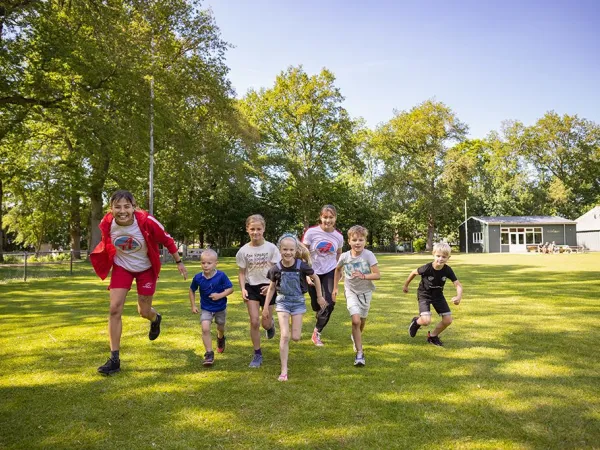 Running kids at Roan at camping Marvilla Parks Friese Meren.