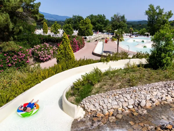 Slide with tire at Roan camping Norcenni Girasole.