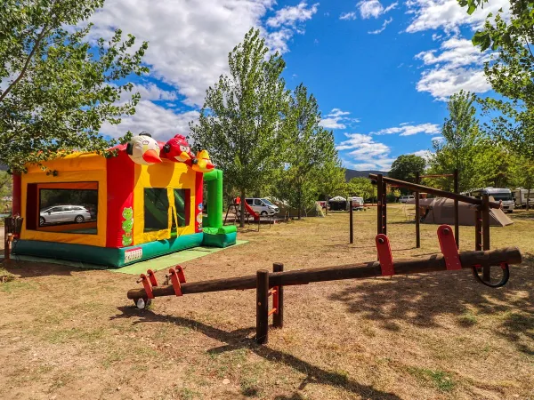 Playground with entertainment equipment at Roan camping Karin.