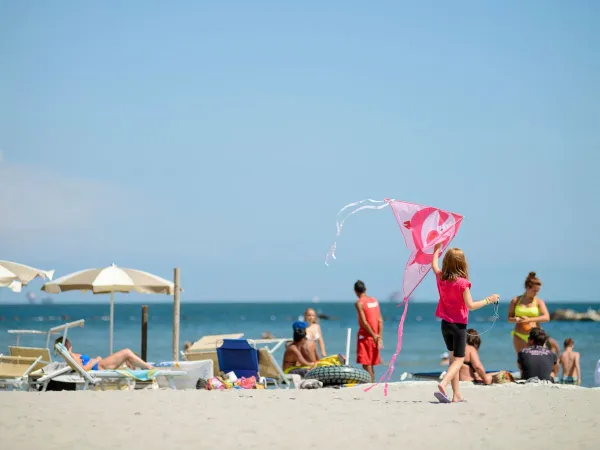 Atmosphere picture beach at Roan camping Adriano Village.