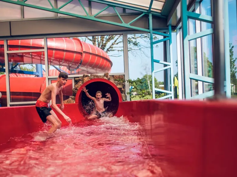 Water fun in the slide at Roan camping Ackersate.
