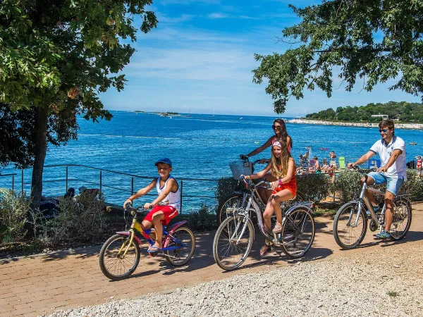 Cycling along the coast at Roan camping Bijela Uvala.