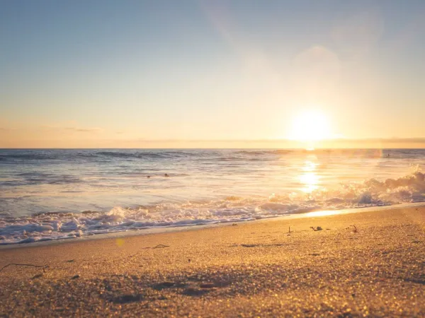 Setting sun on the beach Roan camping Rimini Family Village.