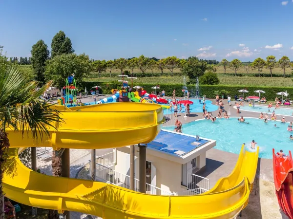 Overview slides with pool at Roan camping San Francesco.