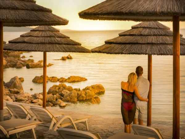 Romantic moment by the beach at Roan camping Krk Camping Resort.