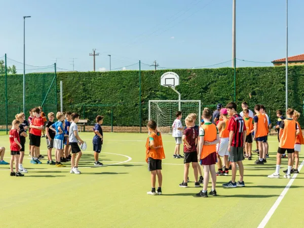 Entertainment on the sports field at Roan camping Bella Italia.