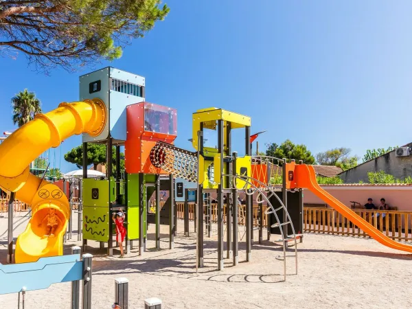 A playground at Roan camping Club Napoléon.