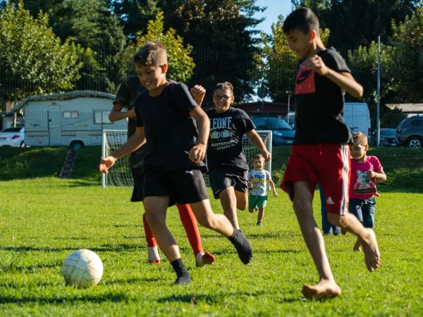 Playing soccer at Roan camping Lido Verbano.