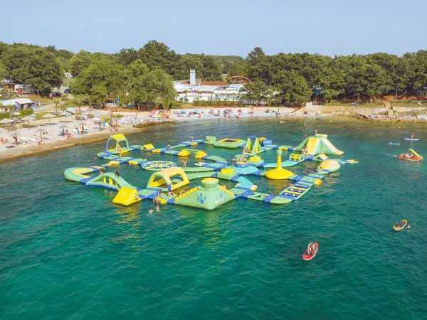 Water playground in the sea at Roan camping Bijela Uvala.