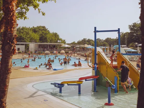 Swimming pool with water playground in the H section at Roan campsite Bijela Uvala.