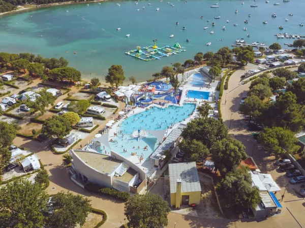 Drone shot of the swimming pool at Roan camping Vestar.