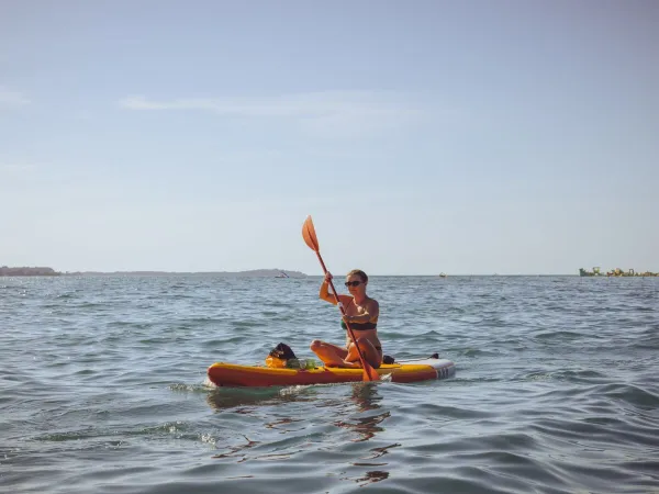 Canoeing in the sea at Roan camping Valkanela.