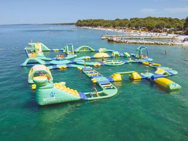 Water play cushions in the sea at Roan camping Bi Village.