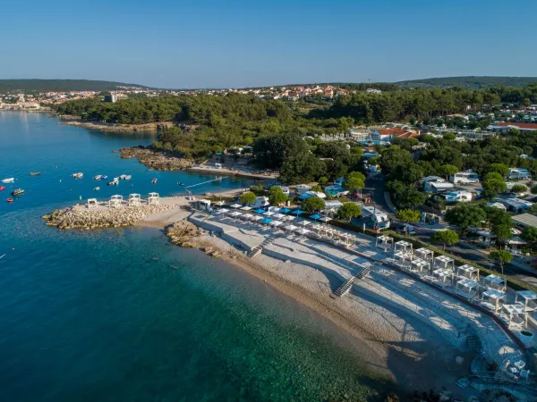 Pebble beach at Roan camping Krk Camping Resort.