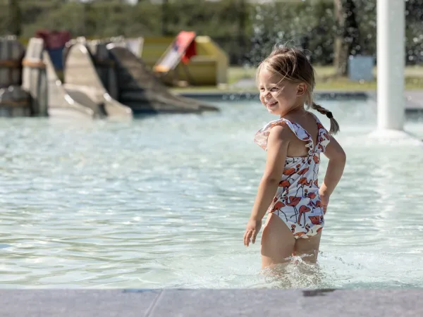 Outdoor toddler pool with slide at Roan camping de Twee Bruggen.