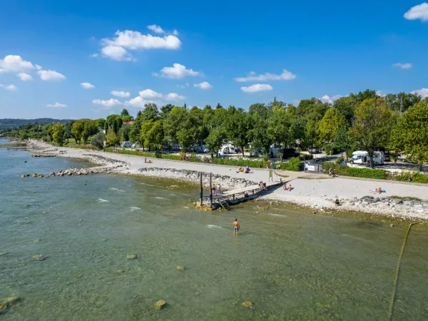 Small beach at Roan camping Piantelle.