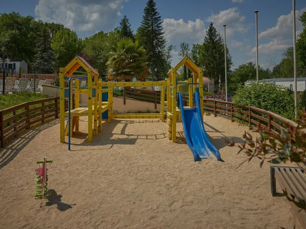 A small playground at Roan camping Le Chêne Gris.