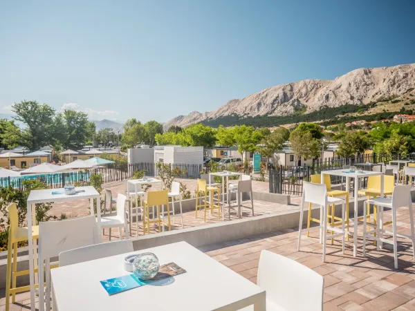 Sunny terrace at Roan camping Baška Beach Camping Resort