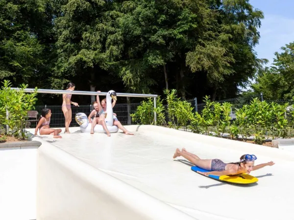 Child from slide at Roan camping hu Birkelt village.
