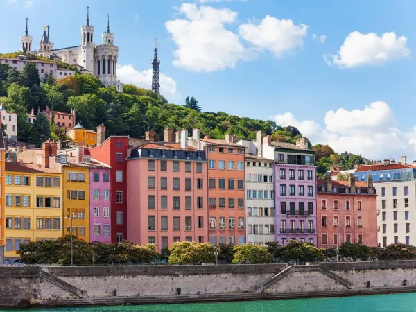 Colored cottages in Lyon near Roan camping Château de Galaure.