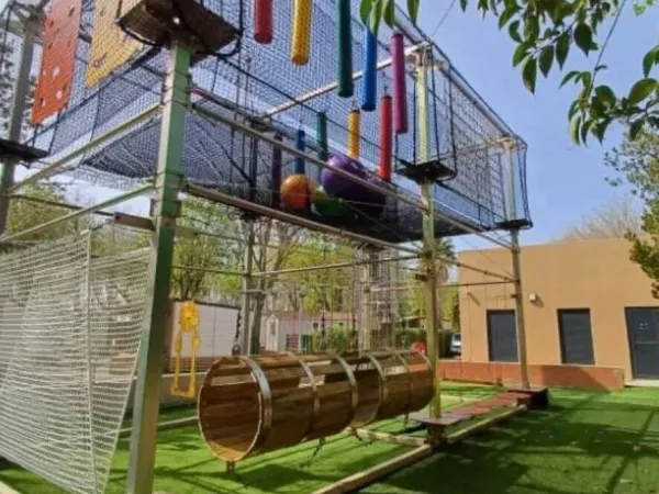 Challenging playground equipment at Roan camping La Chapelle.