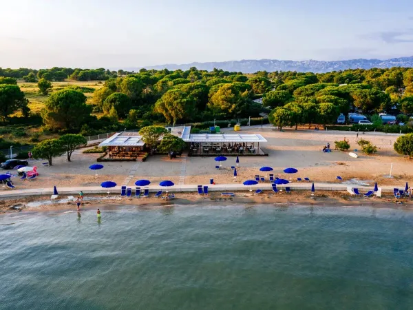 Beach and beach bar at Roan campsite Zaton Holiday resort.