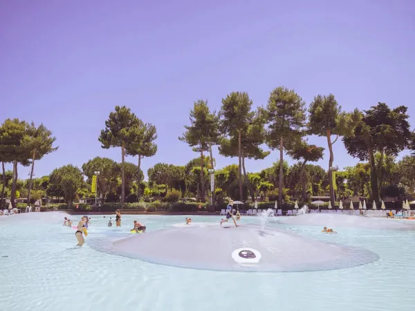 Children playing in the pool at Roan camping hu Park Albatros village.