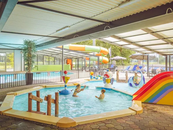 Fun in the children's pool at Roan camping 't Veld.