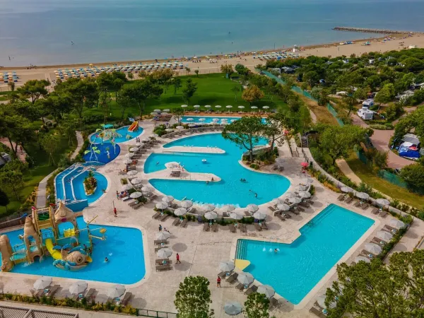 Aerial photo water park combined with the beach at Roan camping Mediterraneo.