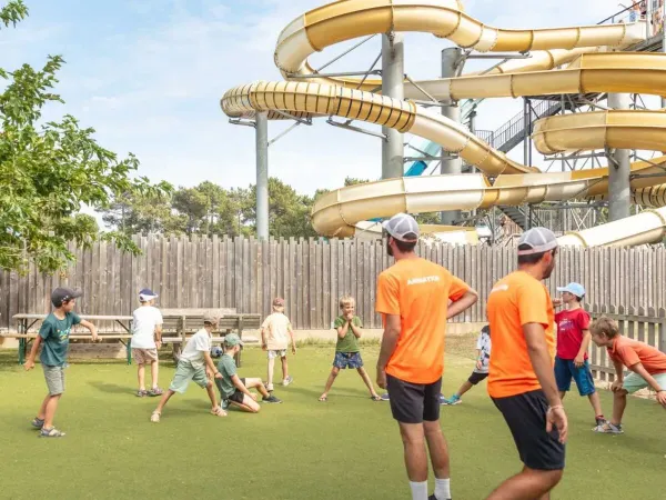 Entertainment with slides in the background at Roan camping Atlantic Club Montalivet